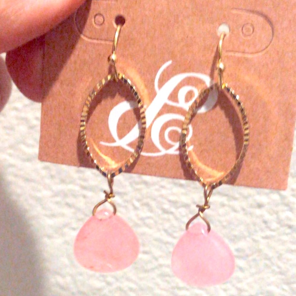 Gold earrings with pink gem
